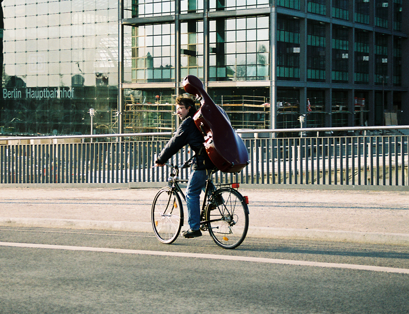 Our founder riding his bike to cello practice