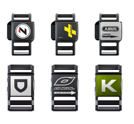 SNAP helmet buckle depicted with different logos and colours