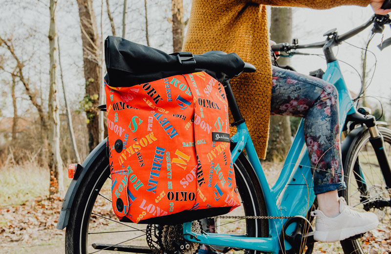 Sarinee backpack attached to a bike as a pannier