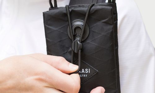 close up braasi pocket with snap fastener 