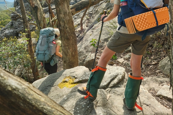 two poeple walking in the wild with Bushwhackers by Banjo Valley