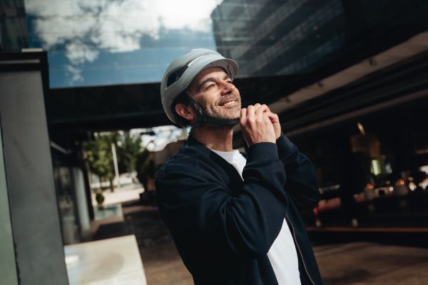 opening the fastener on the unit 1 helmet 