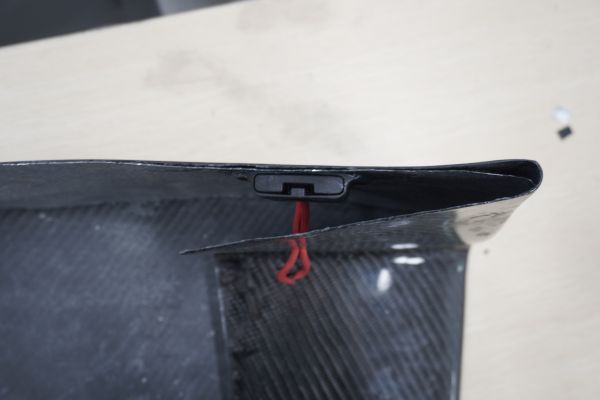 snap fastener built in the car by the racing team 