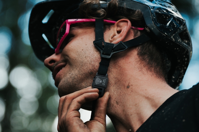 man wearing helmet with twiceme buckle