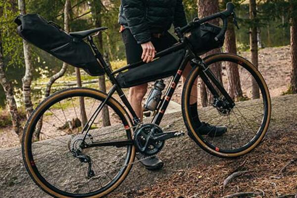 the F/AR bike frame with the installed bikepacking system featuring FIDLOCK